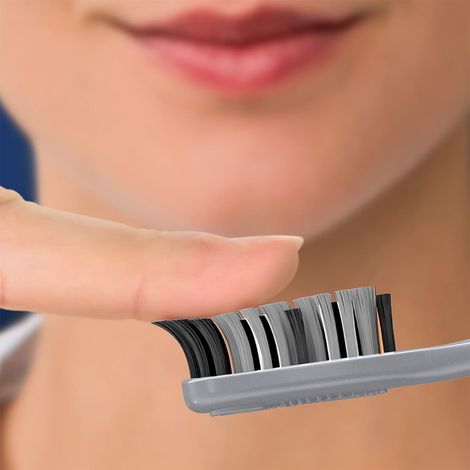 Oral B Cavity Defense Black Manual Toothbrush For Adults With Charcoal Extract- Medium Pack Of 4