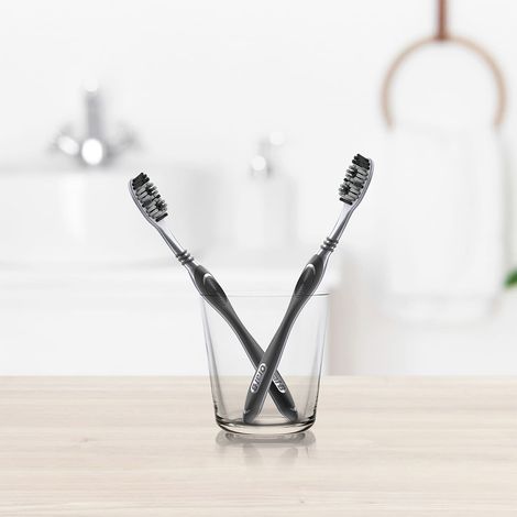 Oral B Cavity Defense Black Manual Toothbrush For Adults With Charcoal Extract- Medium Pack Of 4