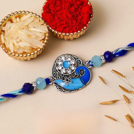 Peacock Blue Designer Rakhi for Brother, Bhai, and Bhaiya with Roli Chawal Pack (eCraftIndia)