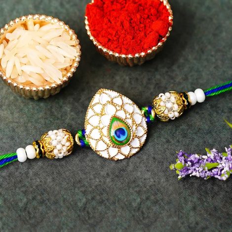 Peacock Feather Pearls Designer Rakhi for Brother, Bhai, and Bhaiya with Roli Chawal Pack (eCraftIndia)