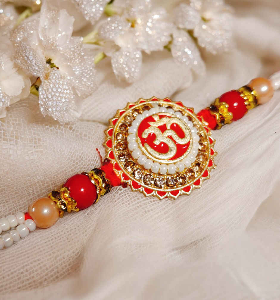 Fabelle, The Bars Treasury, Assorted Chocolates Gift Pack(168gms) & Premium Om Pendant Rakhi With Intricate Moti Pattern In White & Red(1pc) Combo