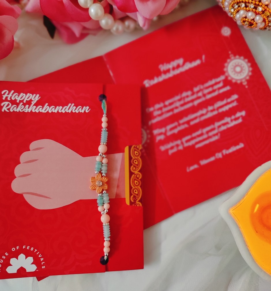 Daadi'S Besan Laddoo Pure Ghee(200gms) & Pastle Green & Pink Flower Design Rakhi(1pc) Combo