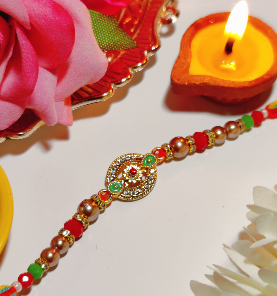 House Of Festivals Designer Rakhi with Traditional Circular Pendant & Moti - Artistic Craft