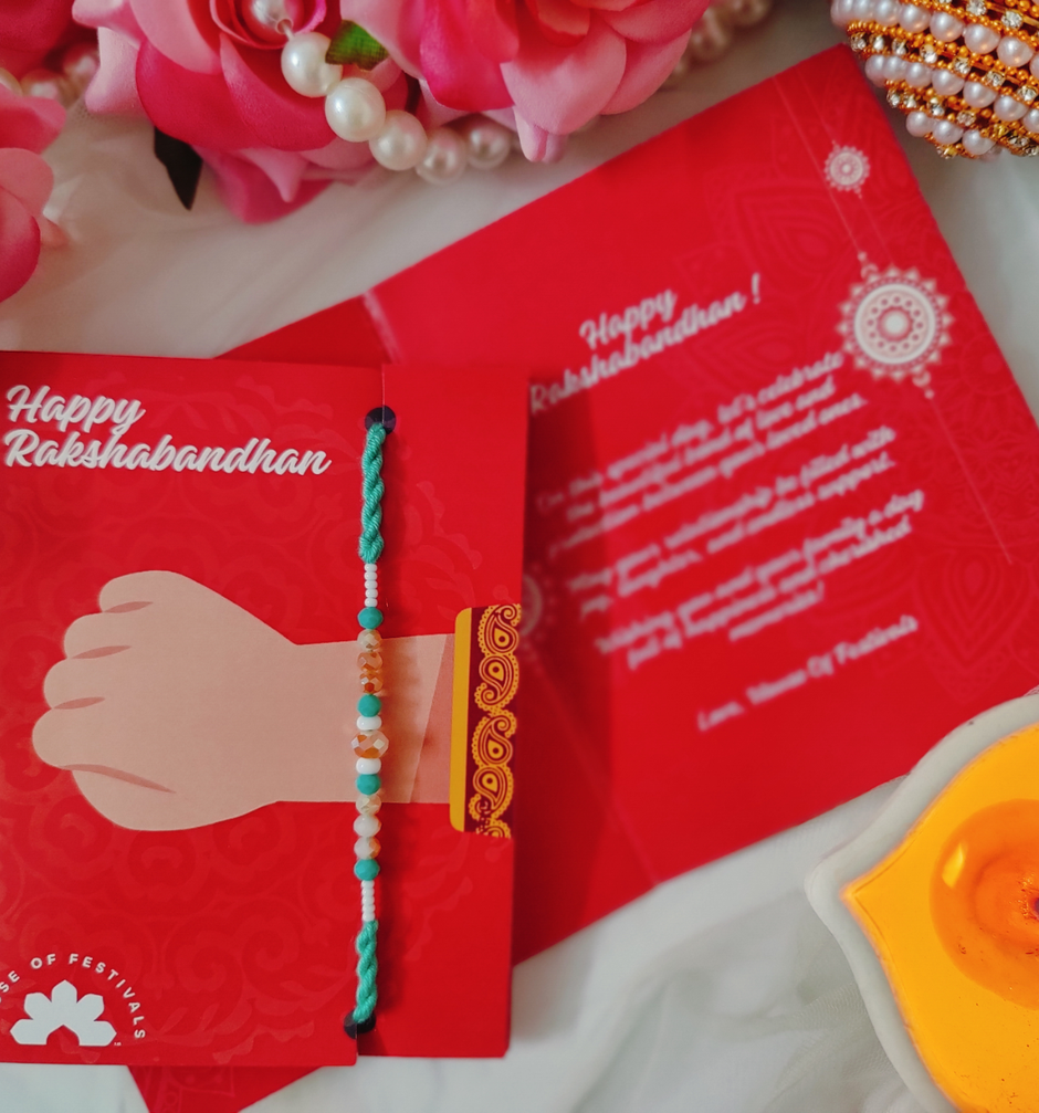 Ferrero Rocher Moments Gift Box(185gms) & Beautifully Weaved Dori Rakhi With Pastle Green & White Color Moti(1pc) Combo