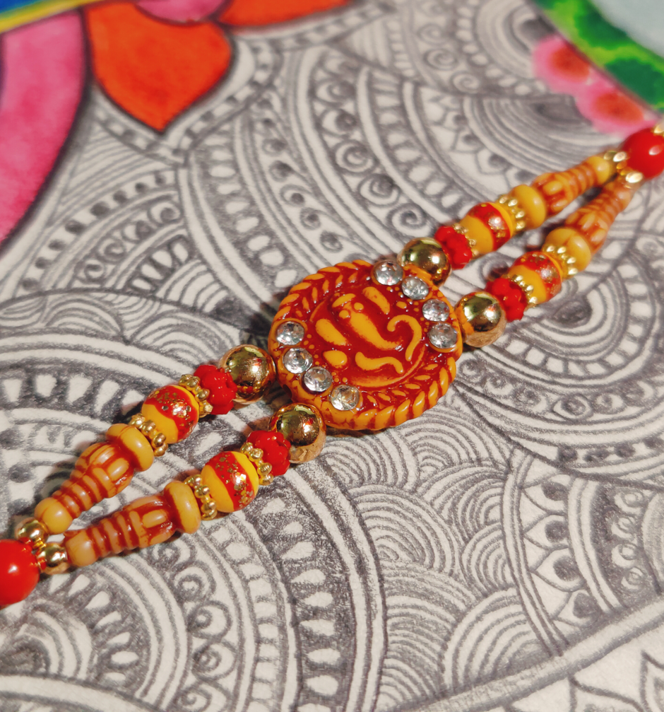 House Of Festivals Ganpati Pendant Rakhi - Double Moti Dori