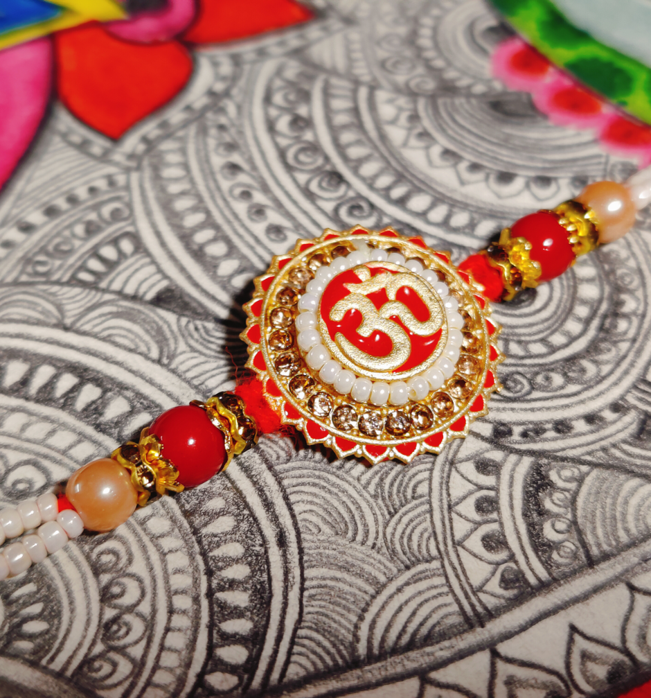 Fabelle, The Bars Treasury, Assorted Chocolates Gift Pack(168gms) & Premium Om Pendant Rakhi With Intricate Moti Pattern In White & Red(1pc) Combo
