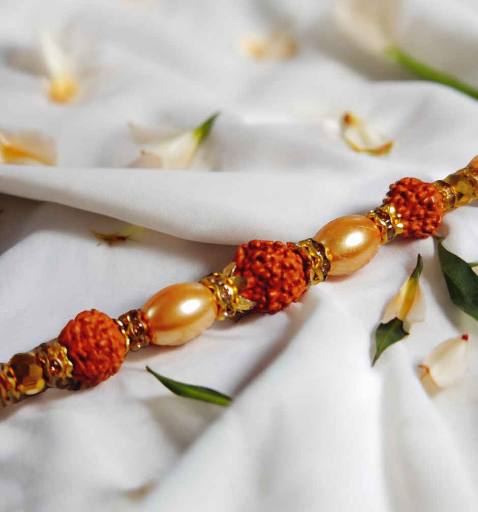 House Of Festivals Rudraksh Dori Rakhi with Brown and Beige Thread ...