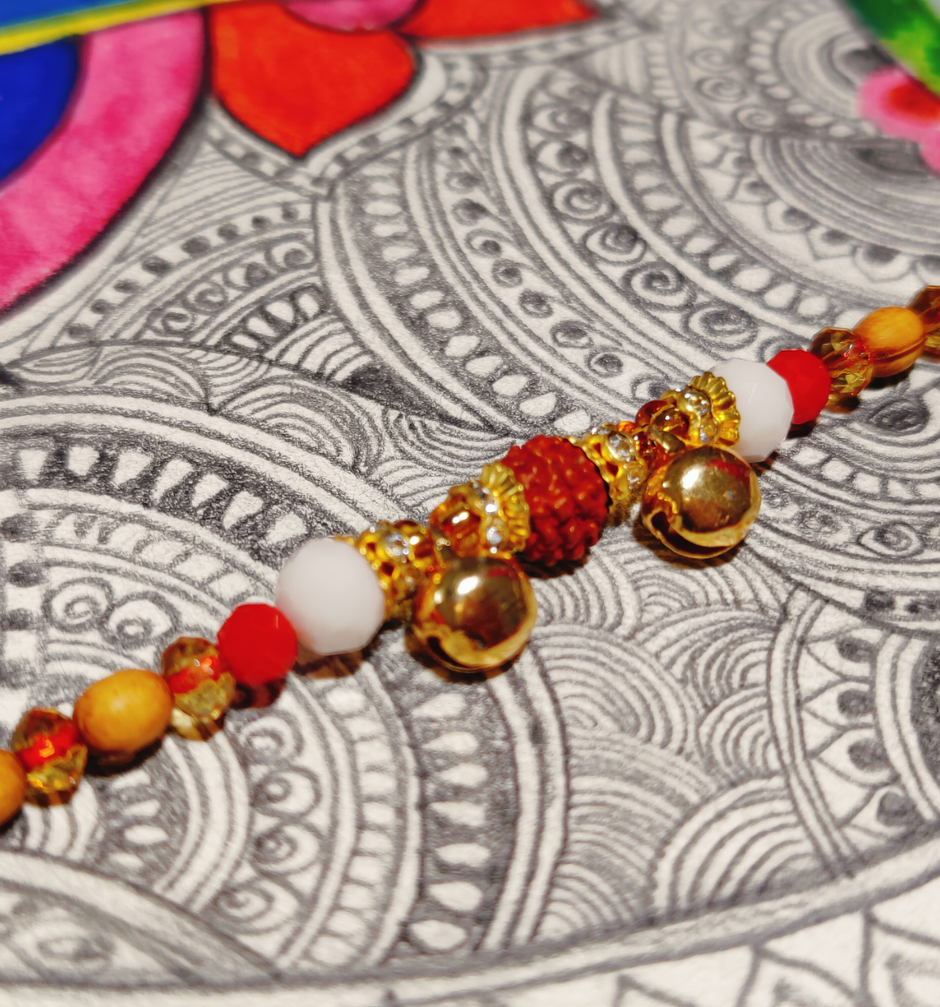 Nandini Milk Peda(250gms) & Ghungroo With Rudraksh Dori Rakhi(1pc) Combo