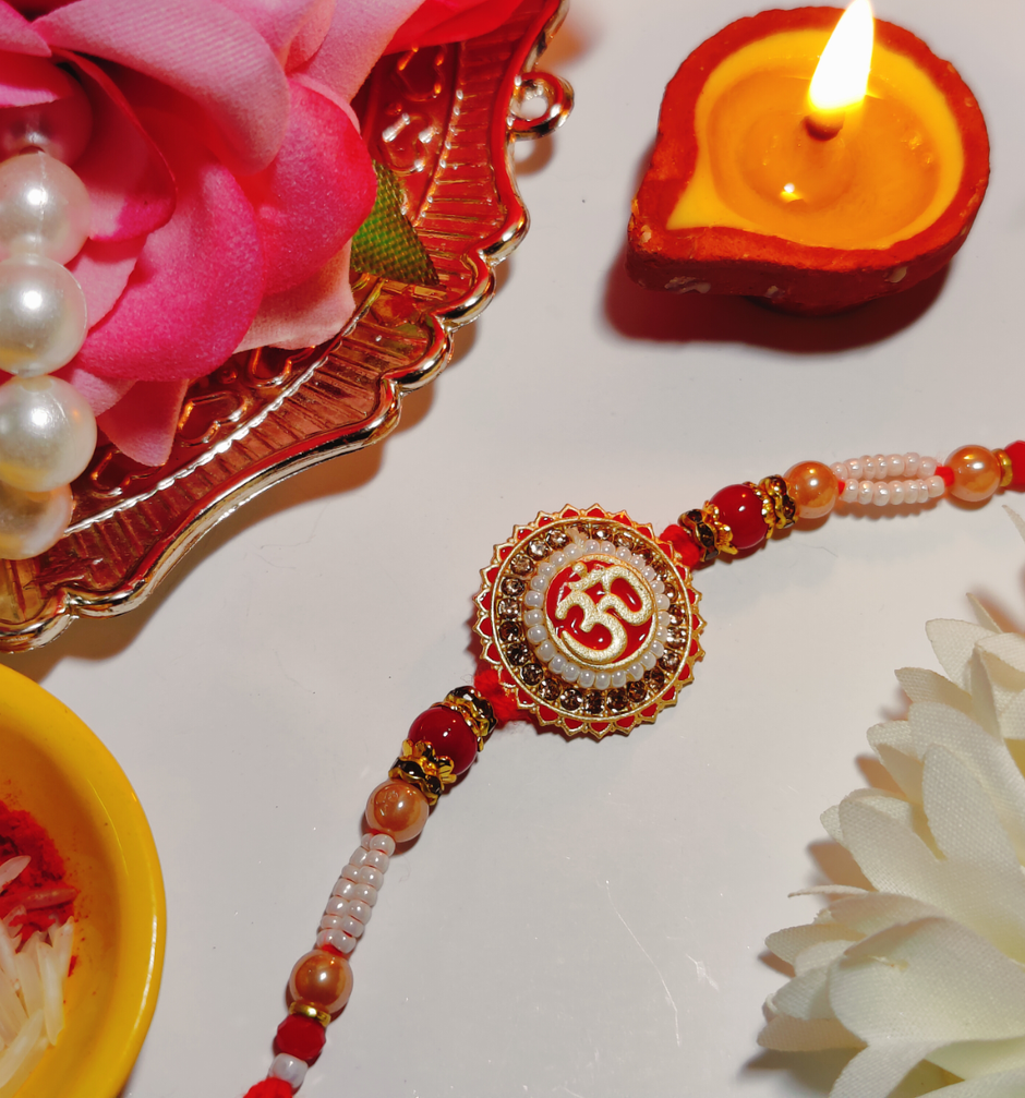 Fabelle, The Bars Treasury, Assorted Chocolates Gift Pack(168gms) & Premium Om Pendant Rakhi With Intricate Moti Pattern In White & Red(1pc) Combo