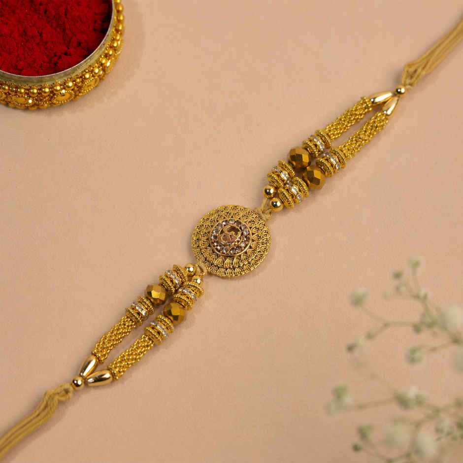 Rakhi for Brother | Om Designer | Religious | Includes Roli Chawal | Pack of 1 | Tied Ribbons