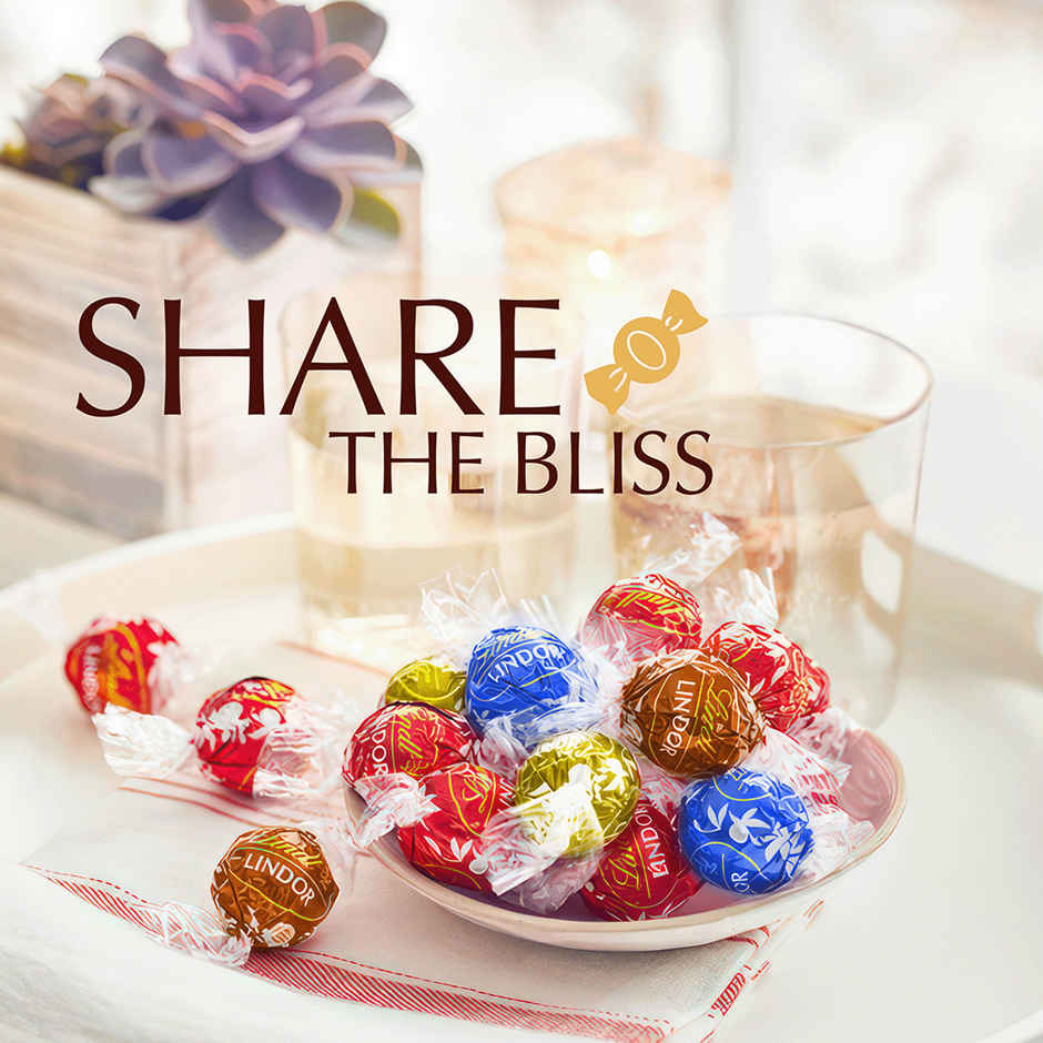 Lindt Lindor Smooth Melting Assorted Chocolates Cornet(200gms) & Skinn Tales W Ibiza(100ml) Combo