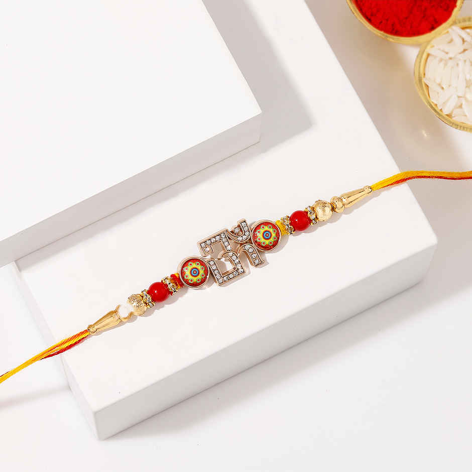 Crystal Studded Om Red & Golden Rakhi | IGP