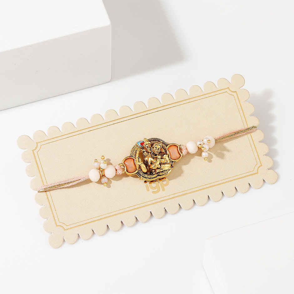 Krishna Devotional Pearl Thread Rakhi | IGP