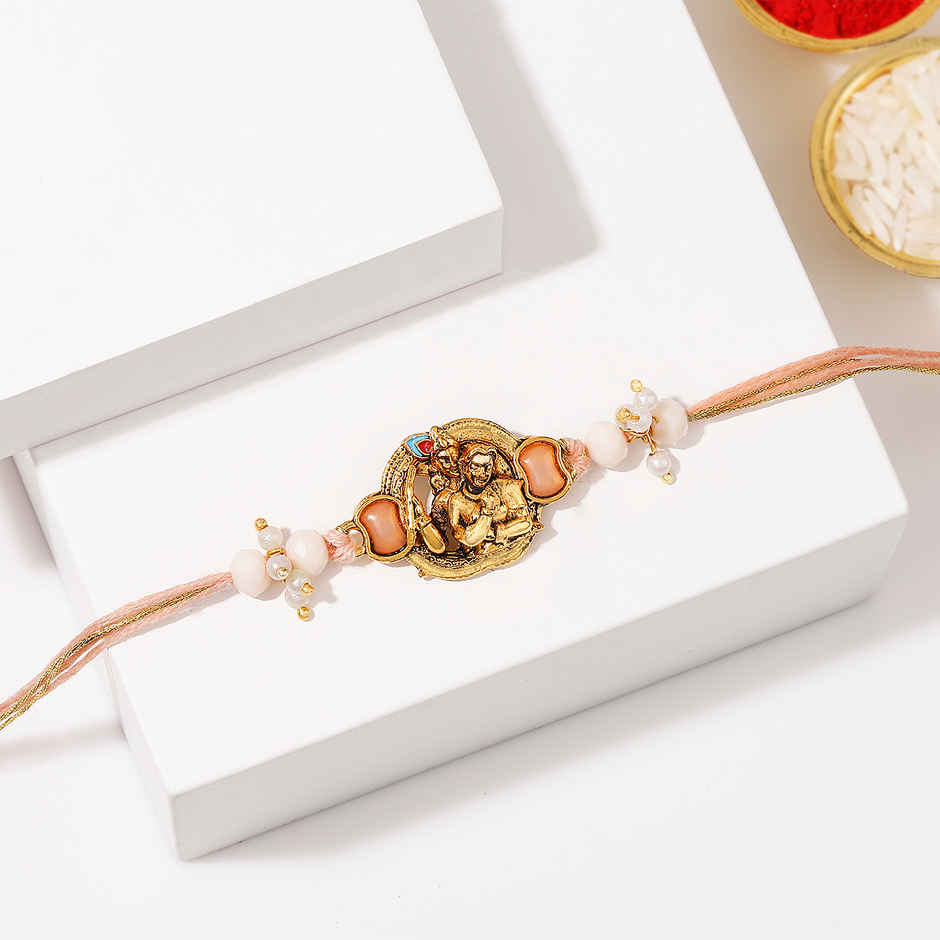 Krishna Devotional Pearl Thread Rakhi | IGP