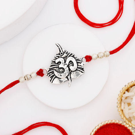 Religious Paan Leaf Om metal Rakhi (IGP)