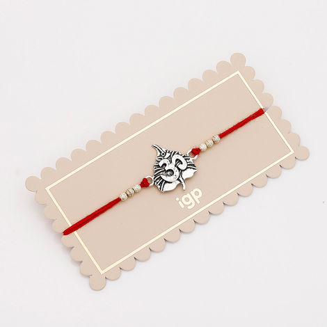 Religious Paan Leaf Om metal Rakhi (IGP)