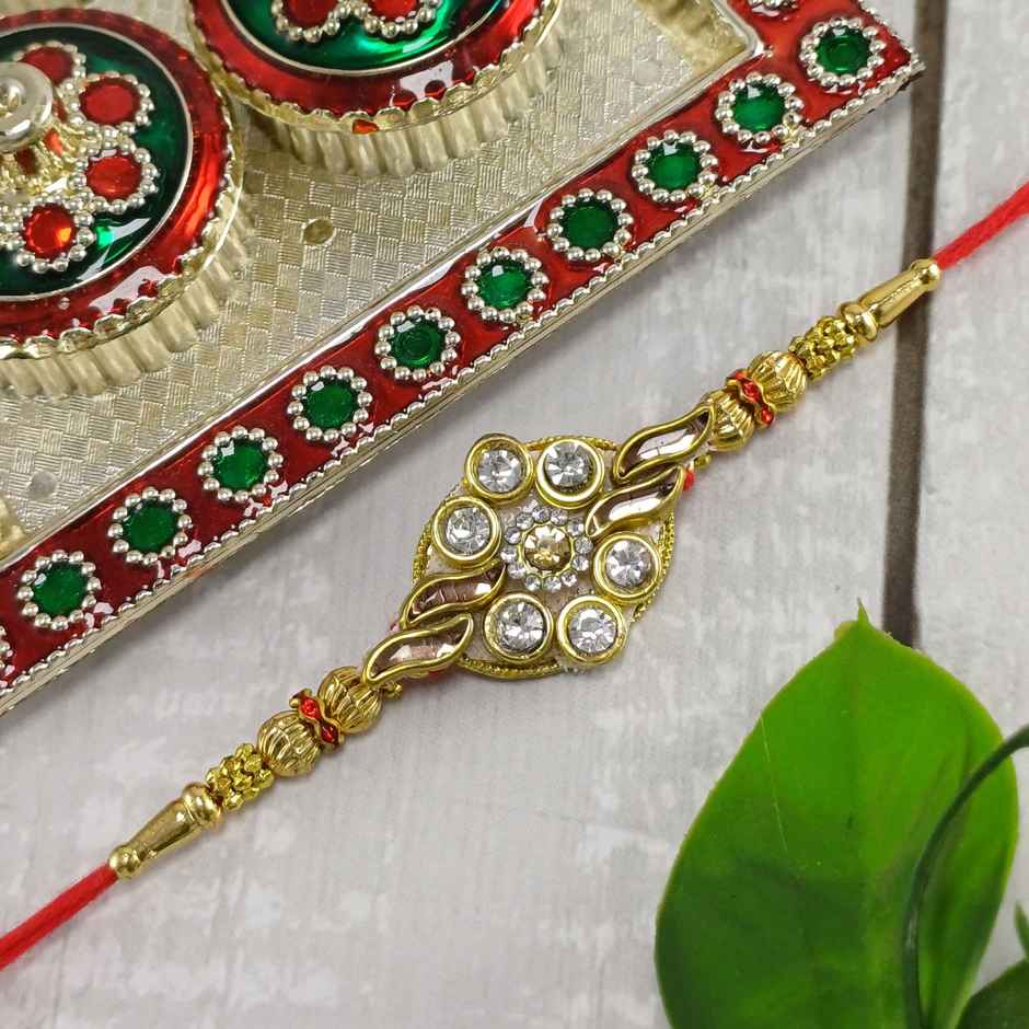 Gullak Kundan Flower With Golden Leaf Rakhi