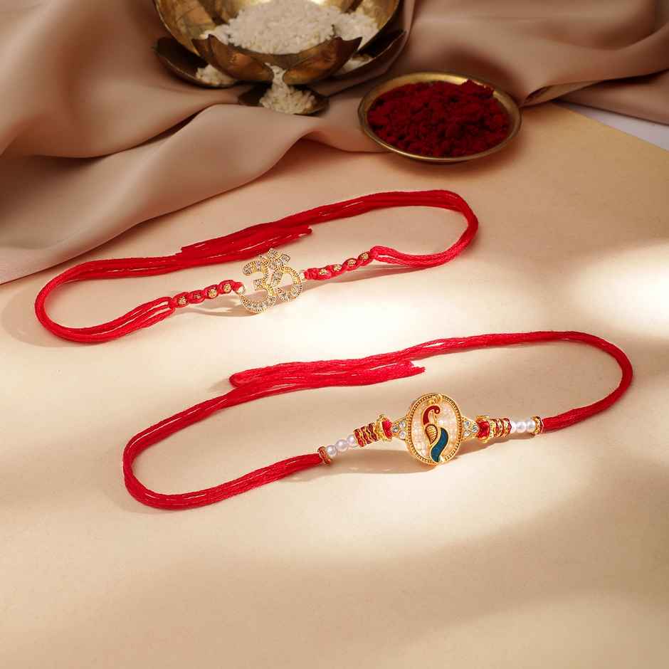 Rubans Gold Toned Set Of 2 Om And Peacock Motif Stone Studded Rakhi - Elegant and Protective