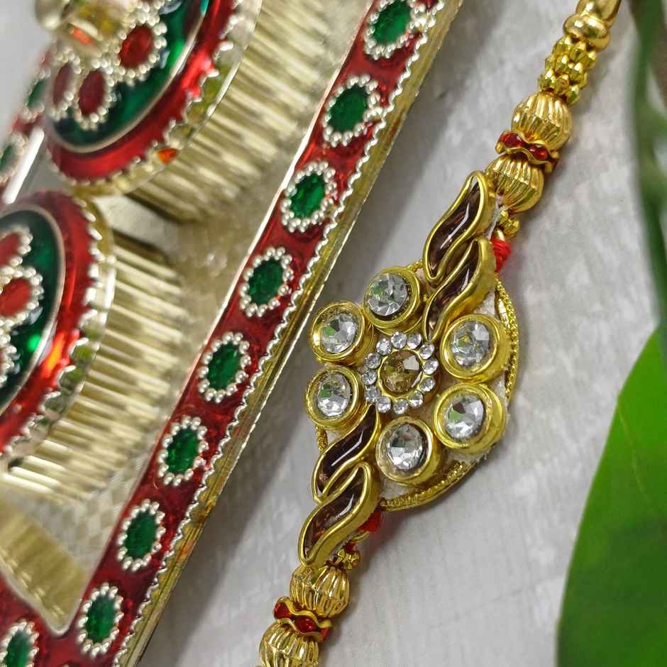 Gullak Kundan Flower With Golden Leaf Rakhi