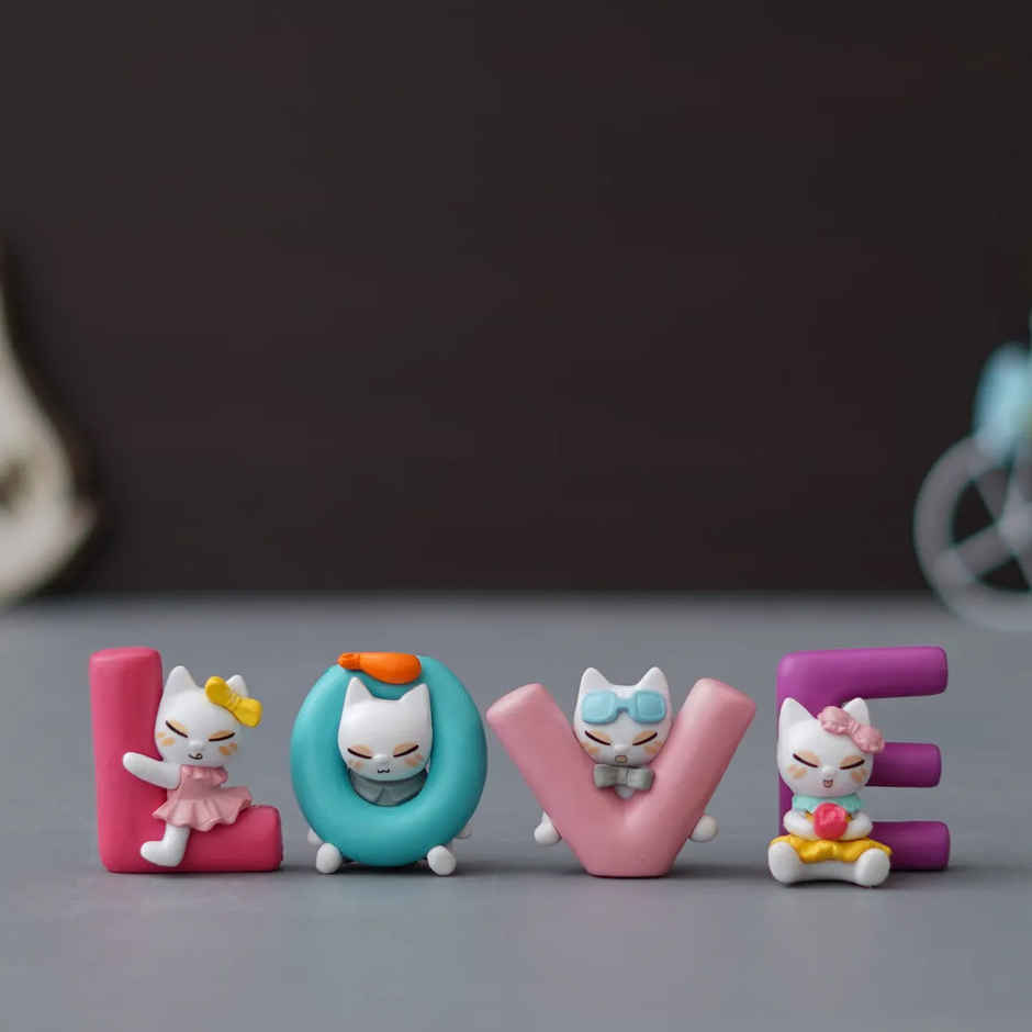 eCraftIndia Multicolor Polyresin Love Animated Characters Decorative Showpiece