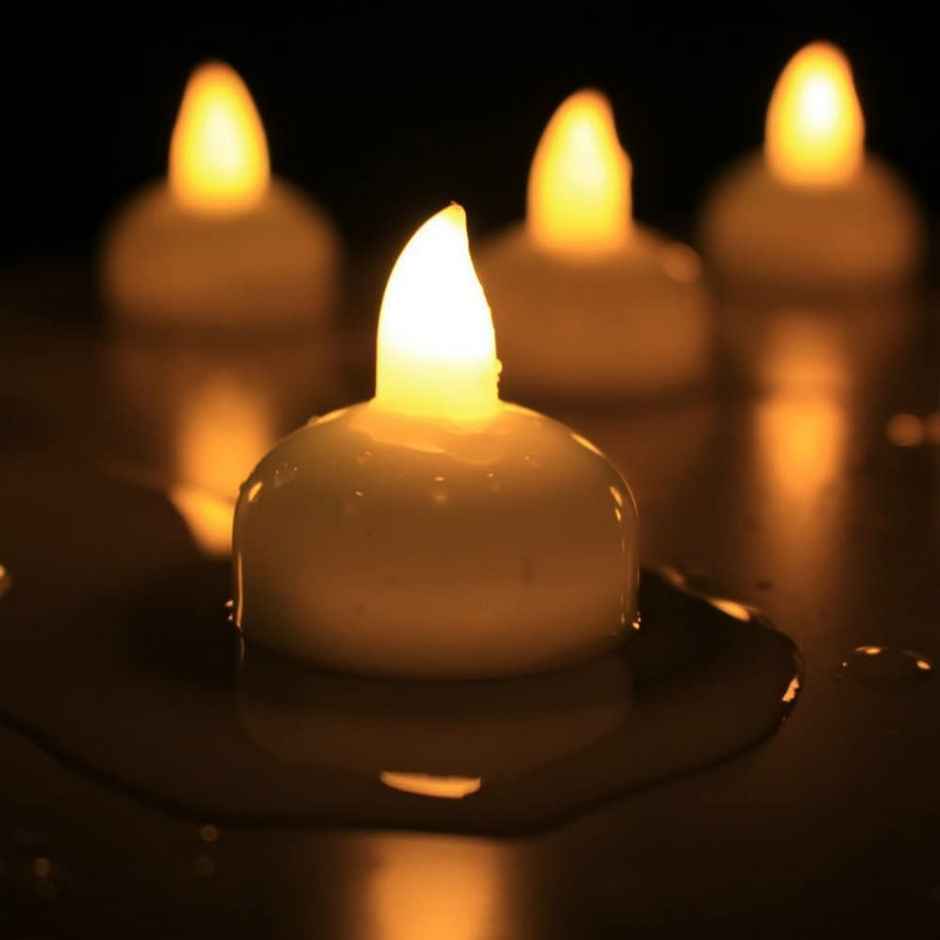 eCraftIndia White Water Sensor Battery Operated Waterproof Flameless LED ight Candles | Set of 6