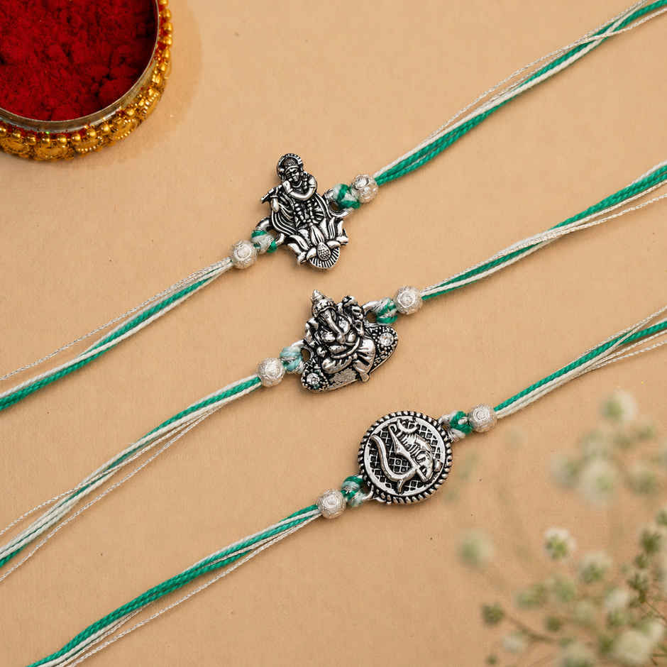Religious Lord Shiva Trishul, Ganesha, Krishna Designer Rakhis for Brother, Bhabhi, Kids & Roli Chawal Pack (eCraftIndia) Set of 3