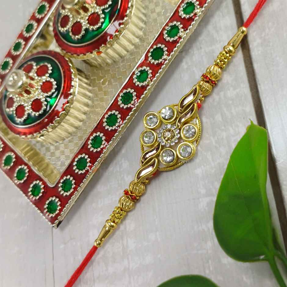 Gullak Kundan Flower With Golden Leaf Rakhi