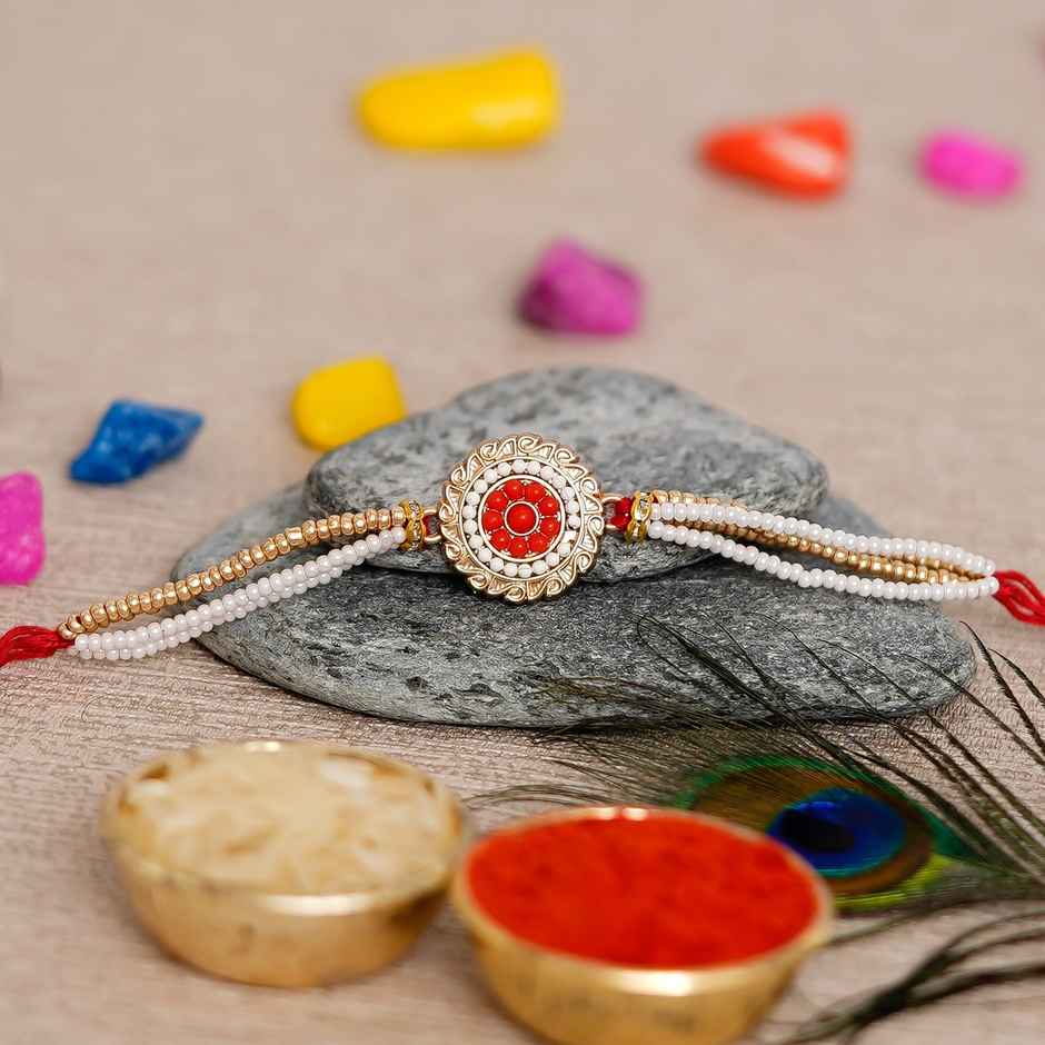 Kundan Red, White & Golden Kundan Pearl Designer Rakhi & Roli Chawal Pack (eCraftIndia)