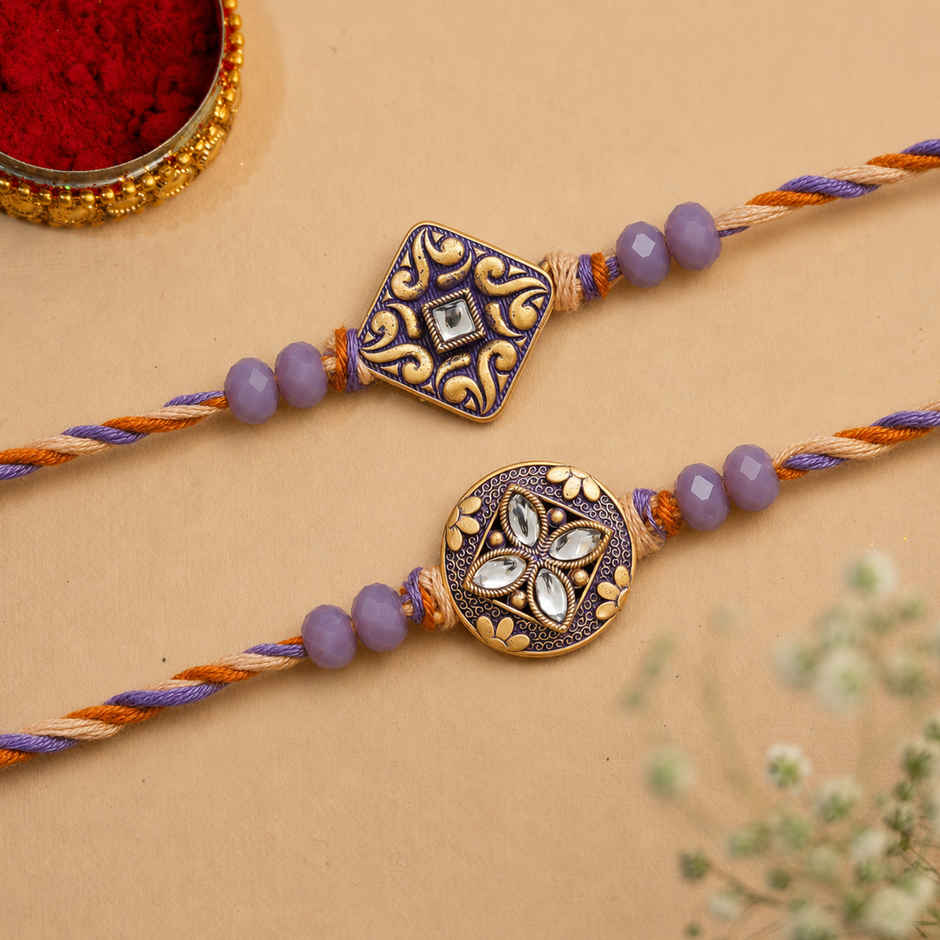 Stone Purple and Golden Precious Stone Designer Rakhis & Roli Chawal Pack (eCraftIndia) Set of 2