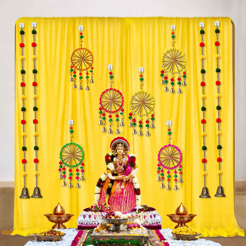 Yellow Backdrop Cloth with Pom Pom Hangings for Haldi Decoration | Party Propz