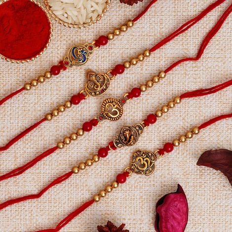 Religious Red & Golden Om Symbol and Lord Ganesha Designer Rakhis & Roli Chawal Pack (eCraftIndia) Set of 5