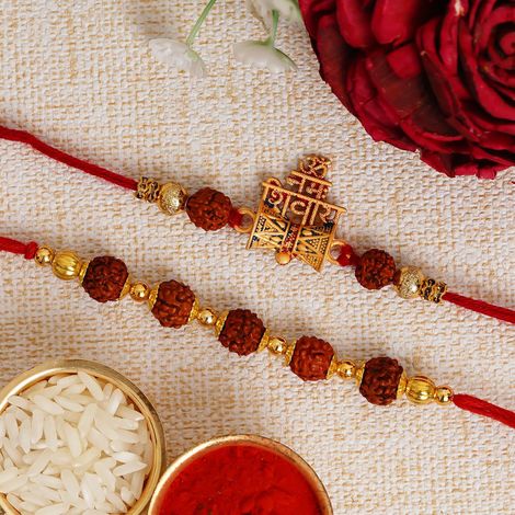 Religious Golden & Brown Om Namah Shivay with Damru and Rudraksha Rakhis & Roli Chawal Pack (eCraftIndia) Set of 2