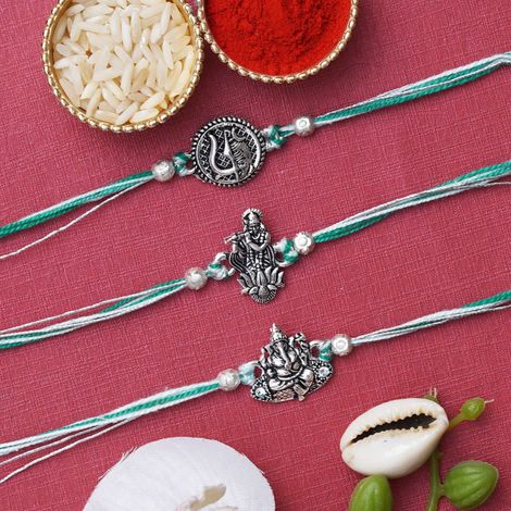 Religious Lord Shiva Trishul, Ganesha, Krishna Designer Rakhis for Brother, Bhabhi, Kids & Roli Chawal Pack (eCraftIndia) Set of 3