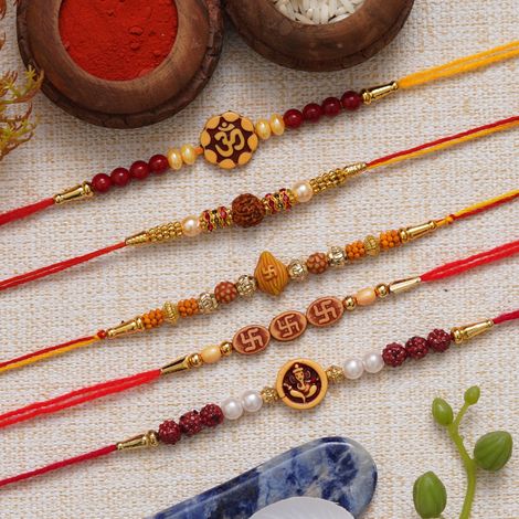 Religious Multicolor Om, Rudraksha, Swastik, Pearls, Ganesha Religious Designer Rakhis & Roli Chawal Pack (eCraftIndia) Set of 5