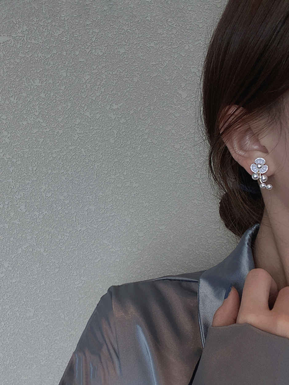 Unwind by Yellow Chimes Gold Plated White Pearl Stud Earrings