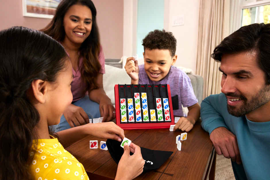 UNO Quatro Game Adult Family and Game Night