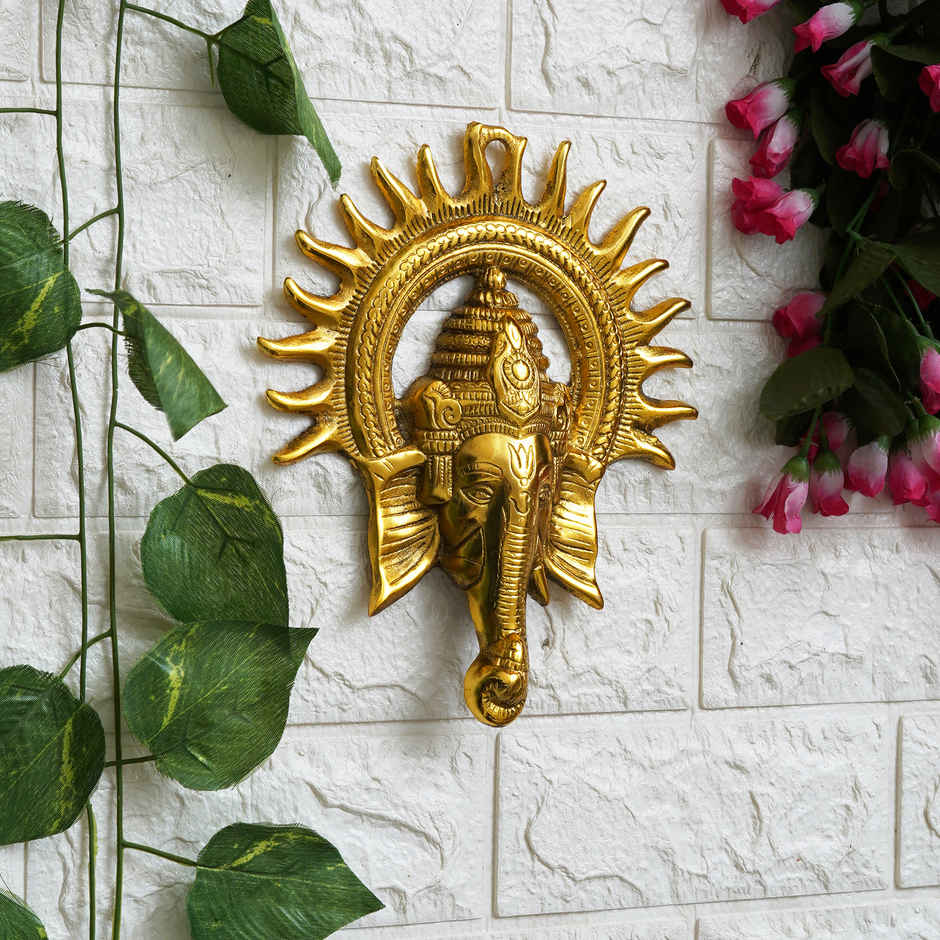 eCraftIndia Golden Lord Ganesha Face With Sun Decorative Metal Wall Hanging Showpiece