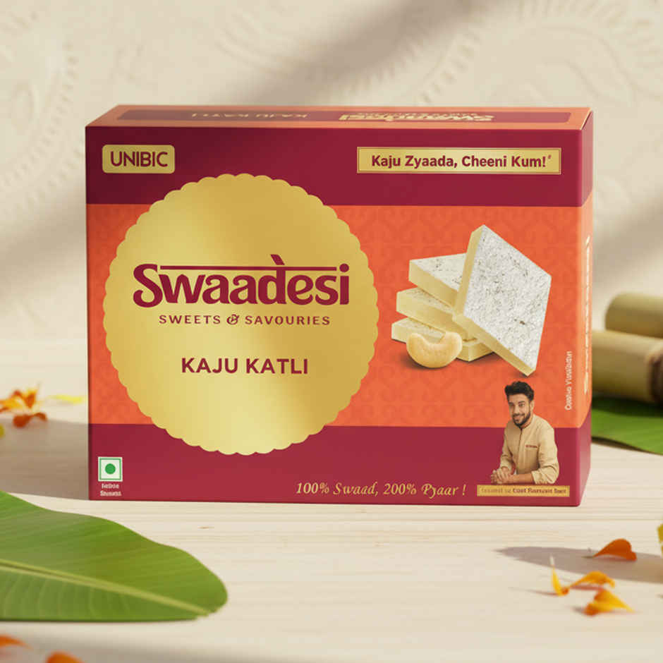 UNIBIC Swaadesi Shahi Kaju Katli Box(240Gms) & Blue Shade Shree Krishna Metal Pendant Rakhi With Moti(1Pc) Combo