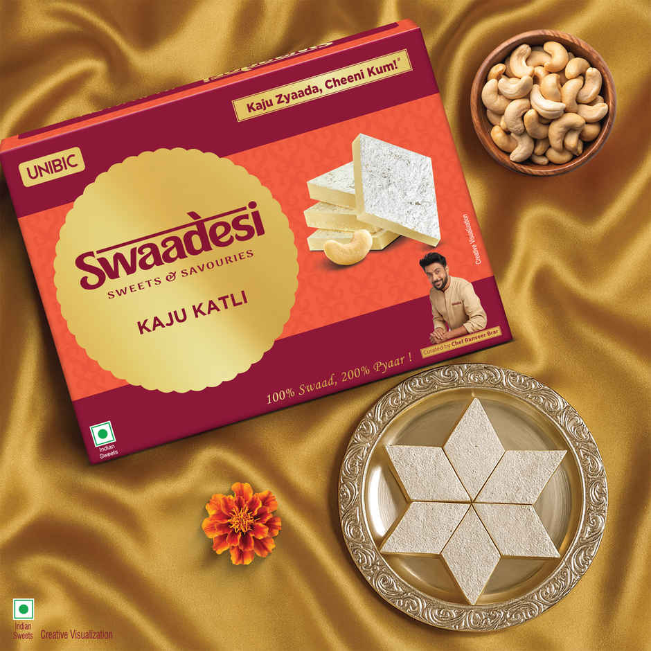 UNIBIC Swaadesi Shahi Kaju Katli Box(240Gms) & Blue Shade Shree Krishna Metal Pendant Rakhi With Moti(1Pc) Combo