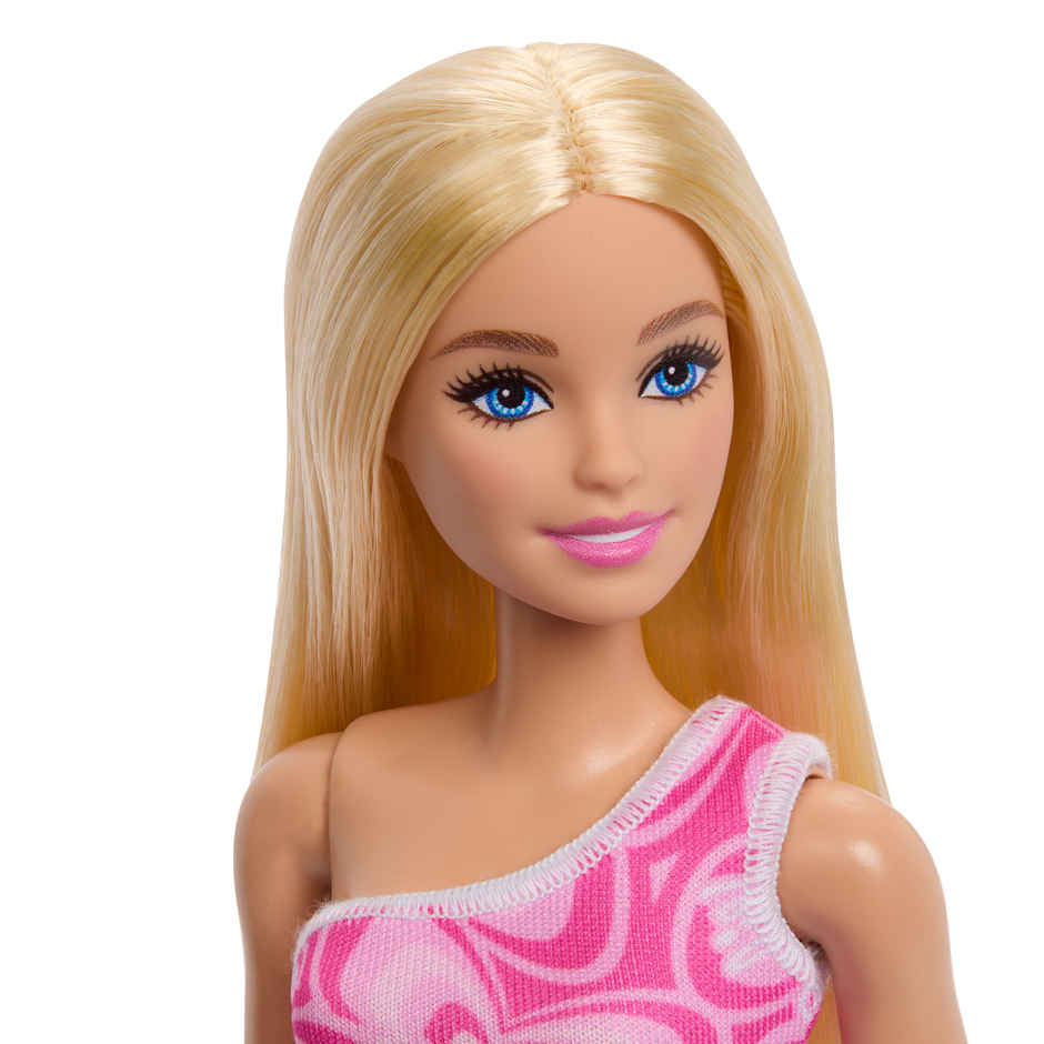 Barbie Fashion Dolls with Variety of Pink Patterned Dresses and Hair Colors