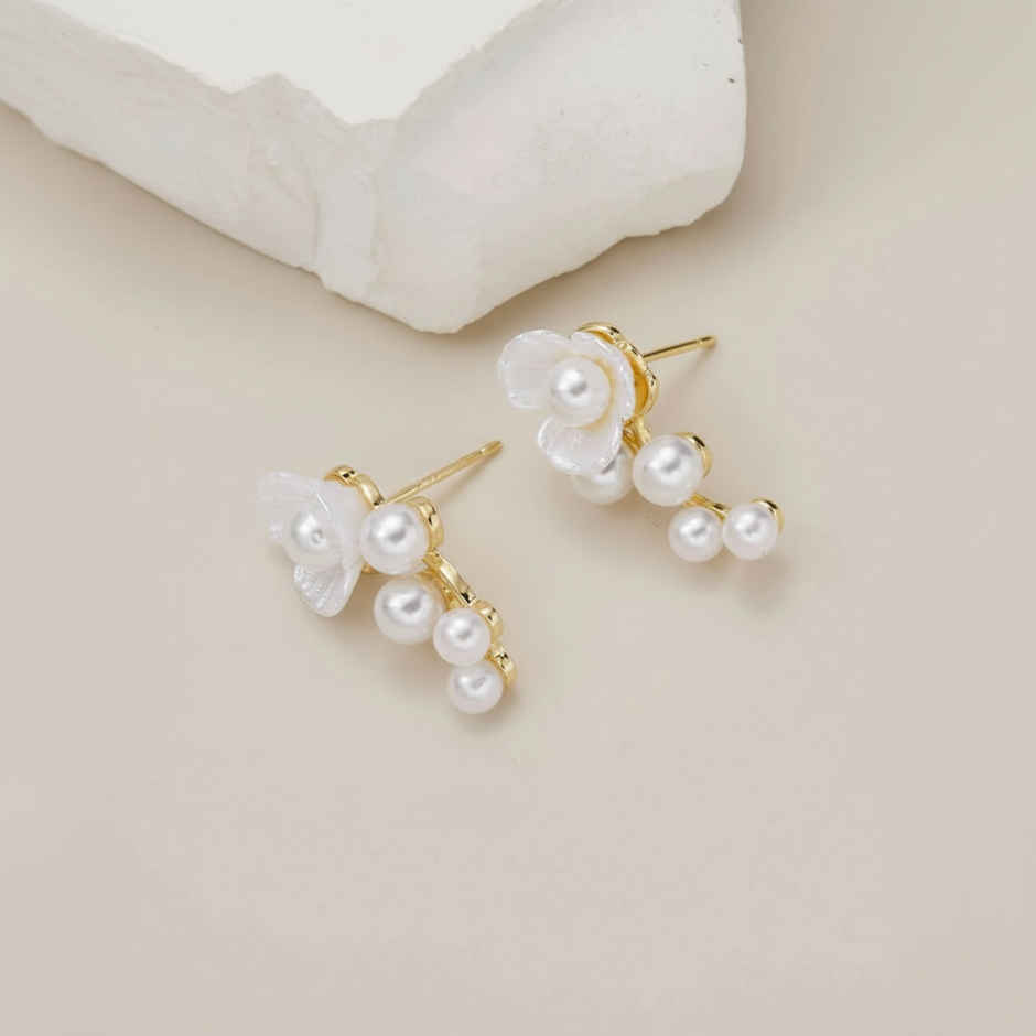 Unwind by Yellow Chimes Gold Plated White Pearl Stud Earrings