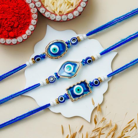 Evil Eye Floral Rakhis for Bhaiya, Bhai, Bhabhi and Kids with Roli Chawal Pack (eCraftIndia) Set of 3