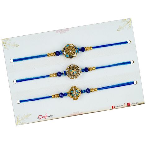 Floral Blue Golden Designer Rakhi for Bhaiya, Bhai, Bhabhi and Kids with Roli Chawal Pack (eCraftIndia) Set of 3