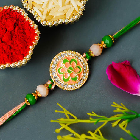 Floral Green Orange Flower Designer Rakhi for Bhaiya, Bhai, Bhabhi and Kids with Roli Chawal Pack (eCraftIndia)