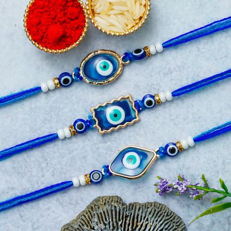 Evil Eye Floral Rakhis for Bhaiya, Bhai, Bhabhi and Kids with Roli Chawal Pack (eCraftIndia) Set of 3