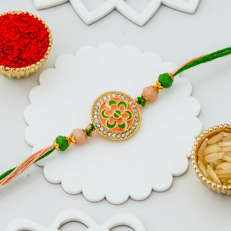 Floral Green Orange Flower Designer Rakhi for Bhaiya, Bhai, Bhabhi and Kids with Roli Chawal Pack (eCraftIndia)