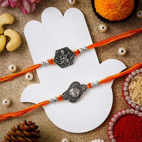Religious Lord Ganesha, Om Symbol Religious Rakhis for Brothers & Roli Chawal Pack (eCraftIndia) Set of 2