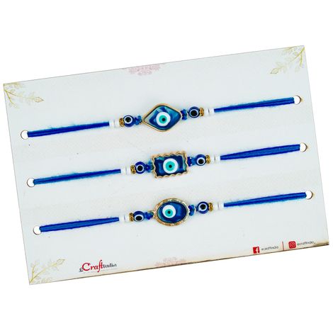 Evil Eye Floral Rakhis for Bhaiya, Bhai, Bhabhi and Kids with Roli Chawal Pack (eCraftIndia) Set of 3