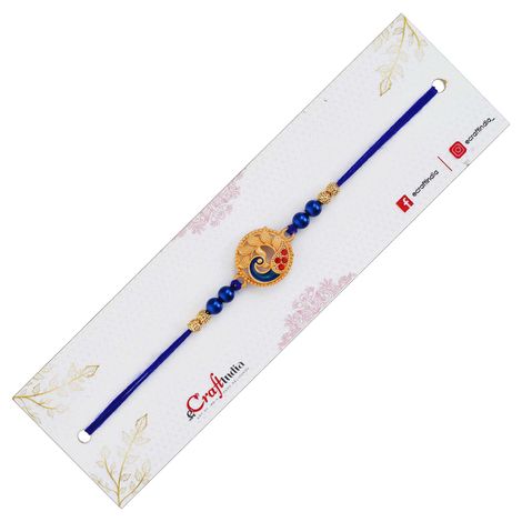 Peacock Blue Golden Designer Rakhi for Brother, Bhai, and Bhaiya with Roli Chawal Pack (eCraftIndia)