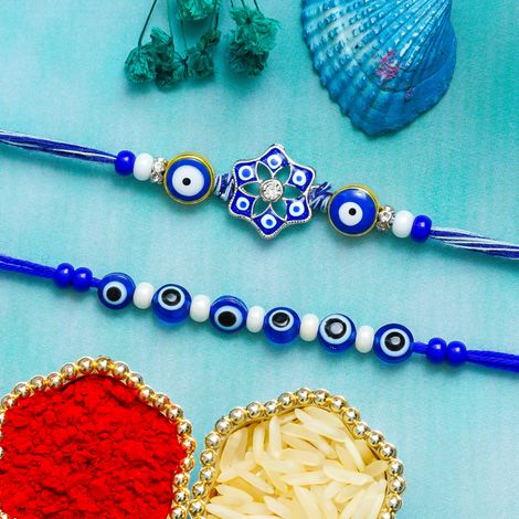 Evil Eye Floral Rakhis for Bhaiya, Bhai, Bhabhi and Kids with Roli Chawal Pack (eCraftIndia) Set of 2